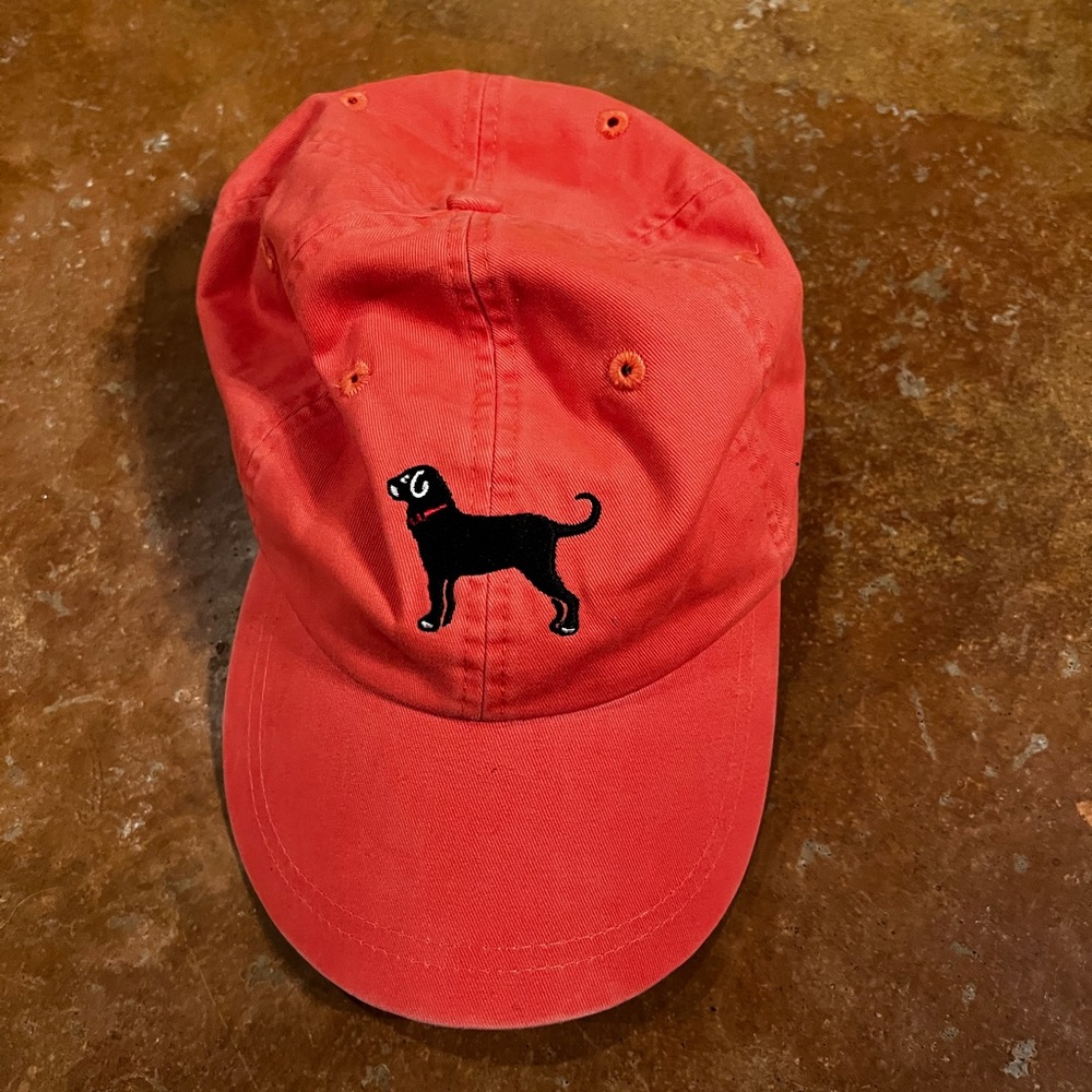 Peach colored The Black Dog women’s hat